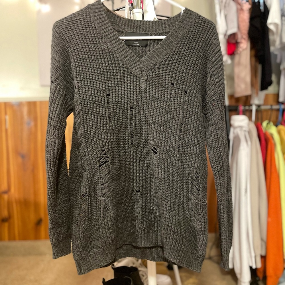 small dark gray sweater fits like a large !